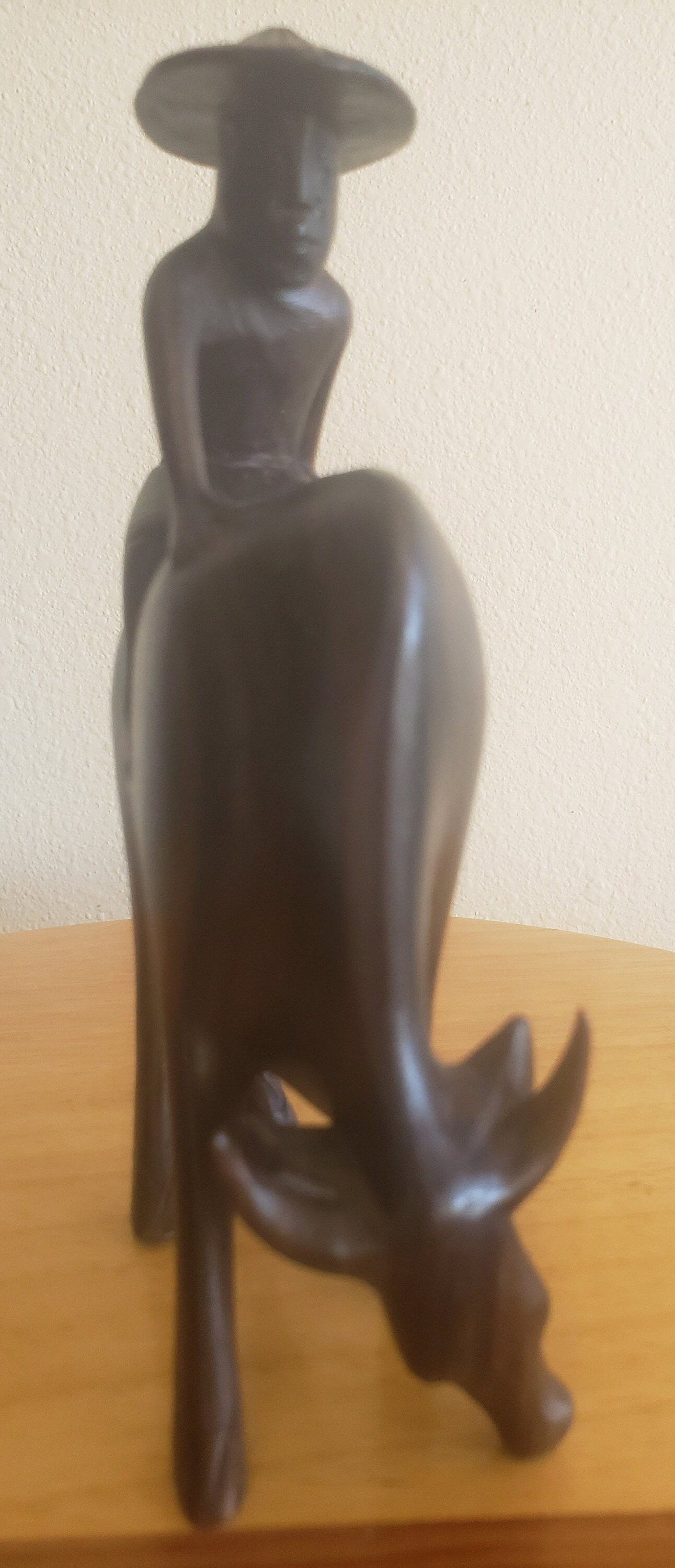 Vintage Rosewood Asian Farmer Sitting on a Water Buffalo