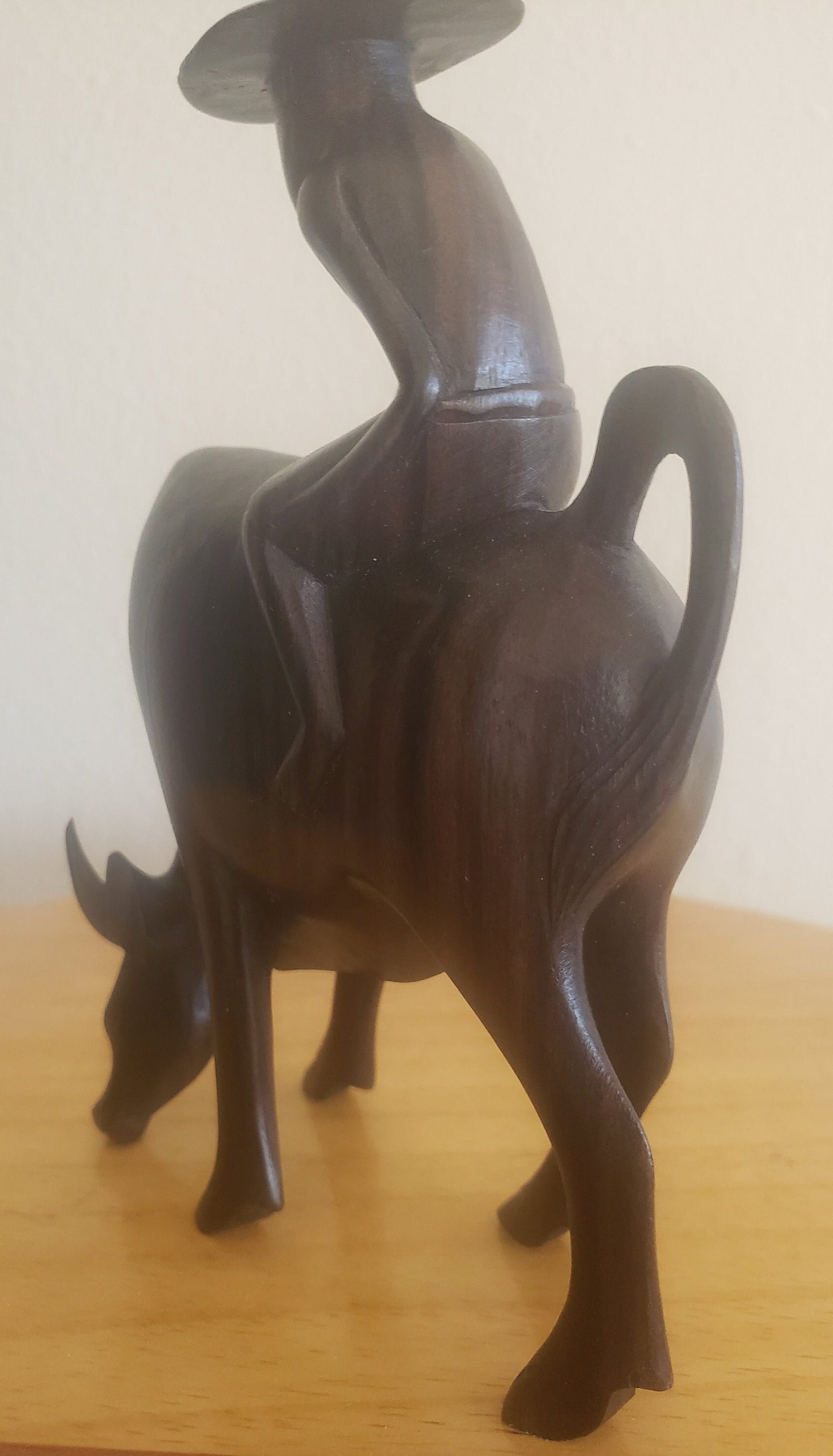 Vintage Rosewood Asian Farmer Sitting on a Water Buffalo