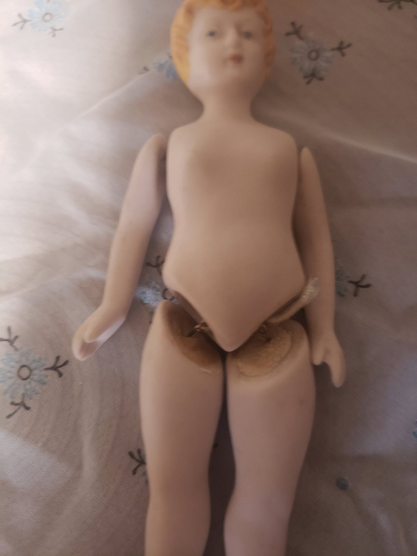 Vintage Porcelain Bisque Doll with Blond Hair and Blue Eyes