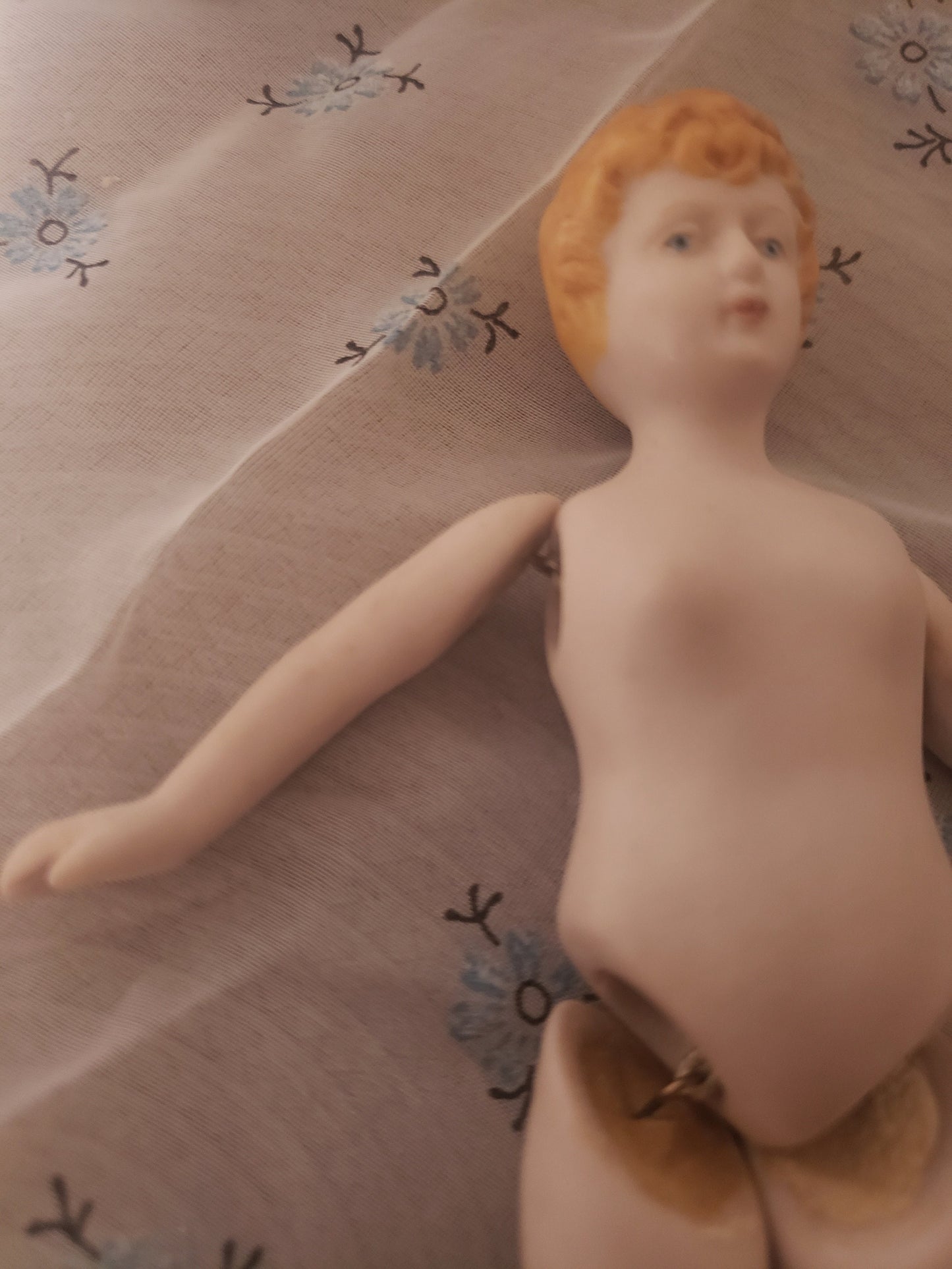 Vintage Porcelain Bisque Doll with Blond Hair and Blue Eyes