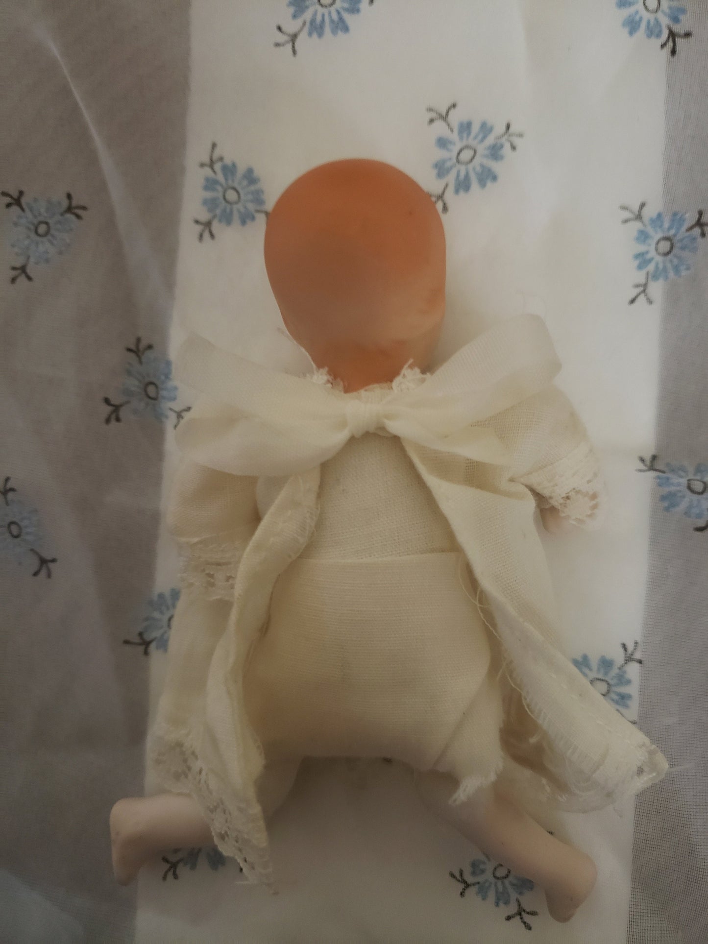 Vintage Blue Eyed Baby Doll in Gown