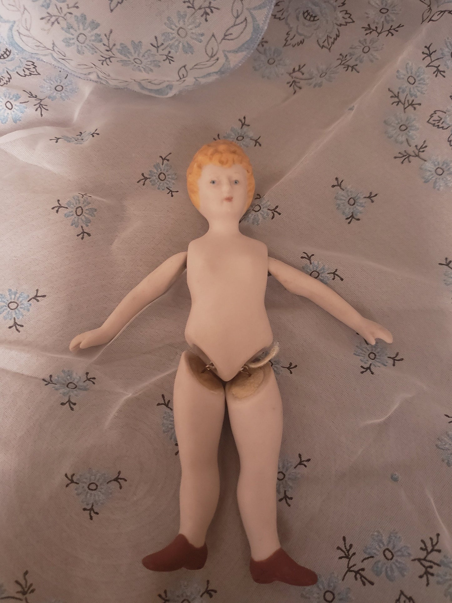 Vintage Porcelain Bisque Doll with Blond Hair and Blue Eyes